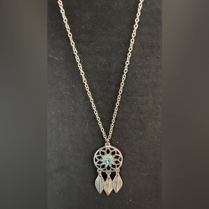Chic Silver Necklace with Blue Accented Dreamcatcher